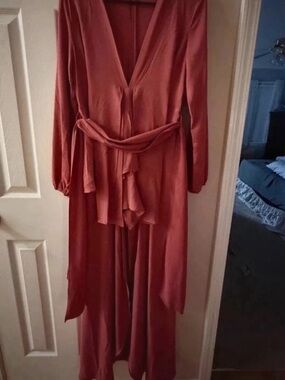 the clothing company Rust-Red Wrap Jumpsuit with Tie Waist